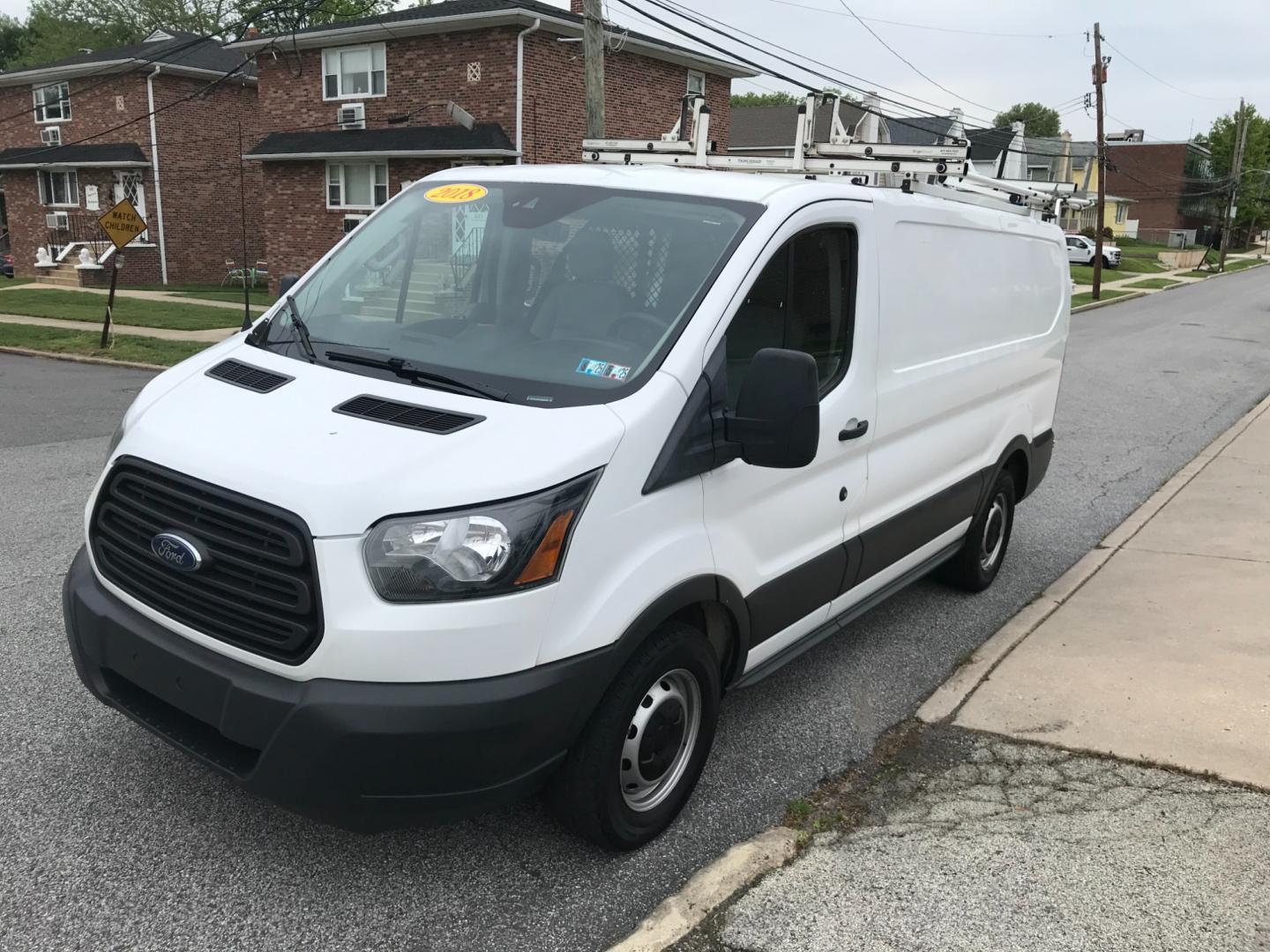 2018 White /Gray Ford Transit 150 (1FTYE1YM1JK) with an 3.7 V6 engine, Automatic transmission, located at 577 Chester Pike, Prospect Park, PA, 19076, (610) 237-1015, 39.886154, -75.302338 - 2018 Ford Transit 150: Dual drop down ladder racks, multiple pieces of shelving, power inverter w/ outlet, heavy duty partition, FLEET MAINTAINED, runs LIKE NEW! This vehicle comes inspected and has been given a bumper to bumper safety check. It is very clean, reliable, and well maintained. We of - Photo#3